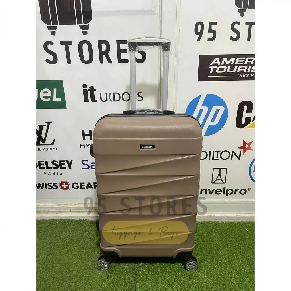 A small cabin pigeon luggage with wheels and a handle, beige color.