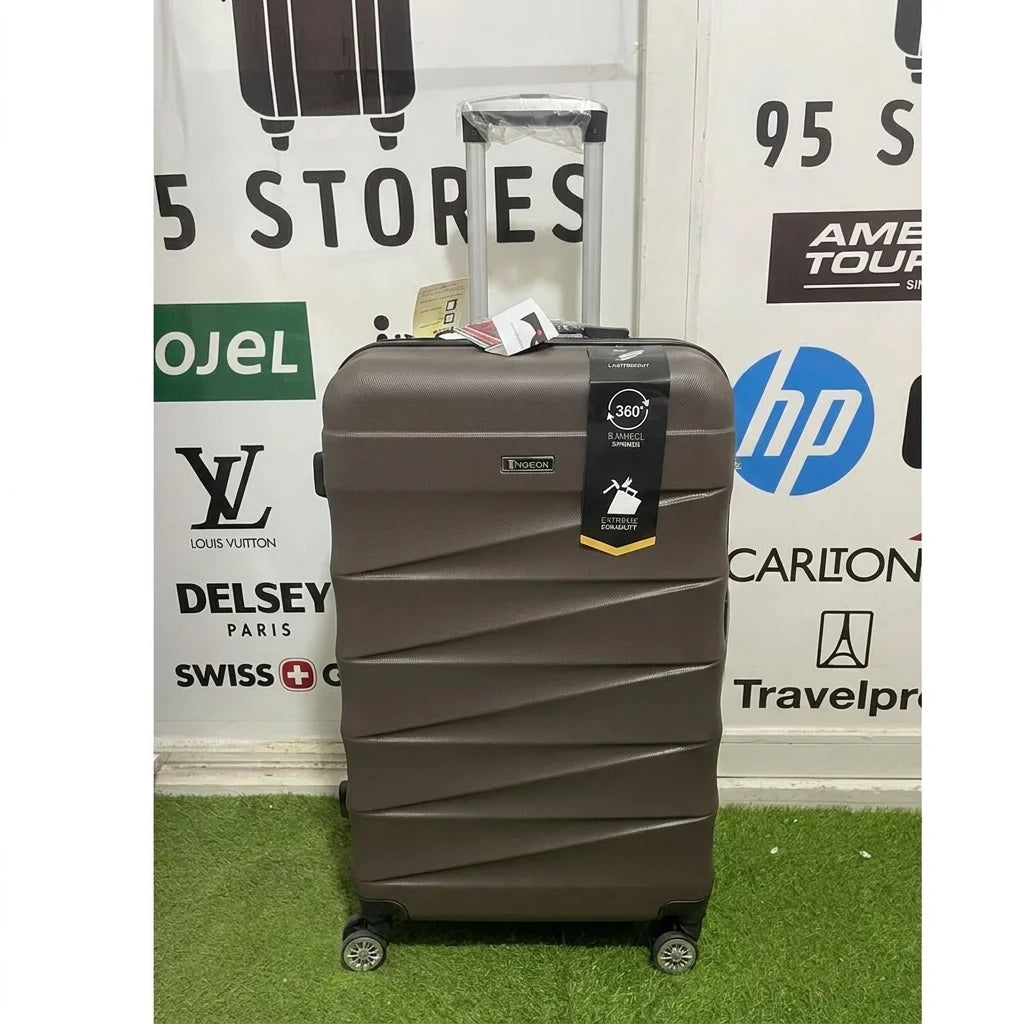 A small cabin pigeon luggage with wheels and a handle, brown color.